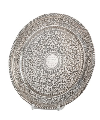 Lot 108 - AN INDIAN SILVER SALVER, OOMERSI MAWJI, BHUJ, CIRCA 1874