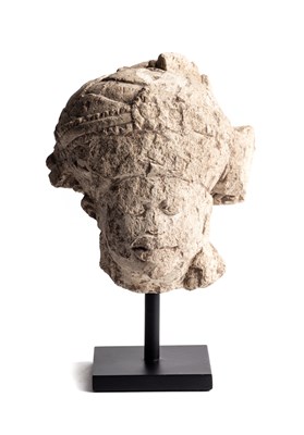 Lot 164 - A MAJAPAHIT PUMICE HEAD OF A RULER