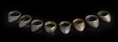 Lot 142 - TWELVE INDO-PERSIAN COPPER ALLOY ARCHER'S RINGS, 16TH/18TH CENTURY