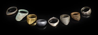 Lot 146 - TWELVE MIDDLE EASTERN AND ASIAN ARCHER'S RINGS, 16TH/19TH CENTURY