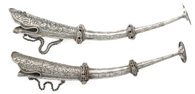 Lot 418 - Ëœâ–¡ TWO TELESCOPIC SILVER RITUAL HORNS (DSOG-KANG)