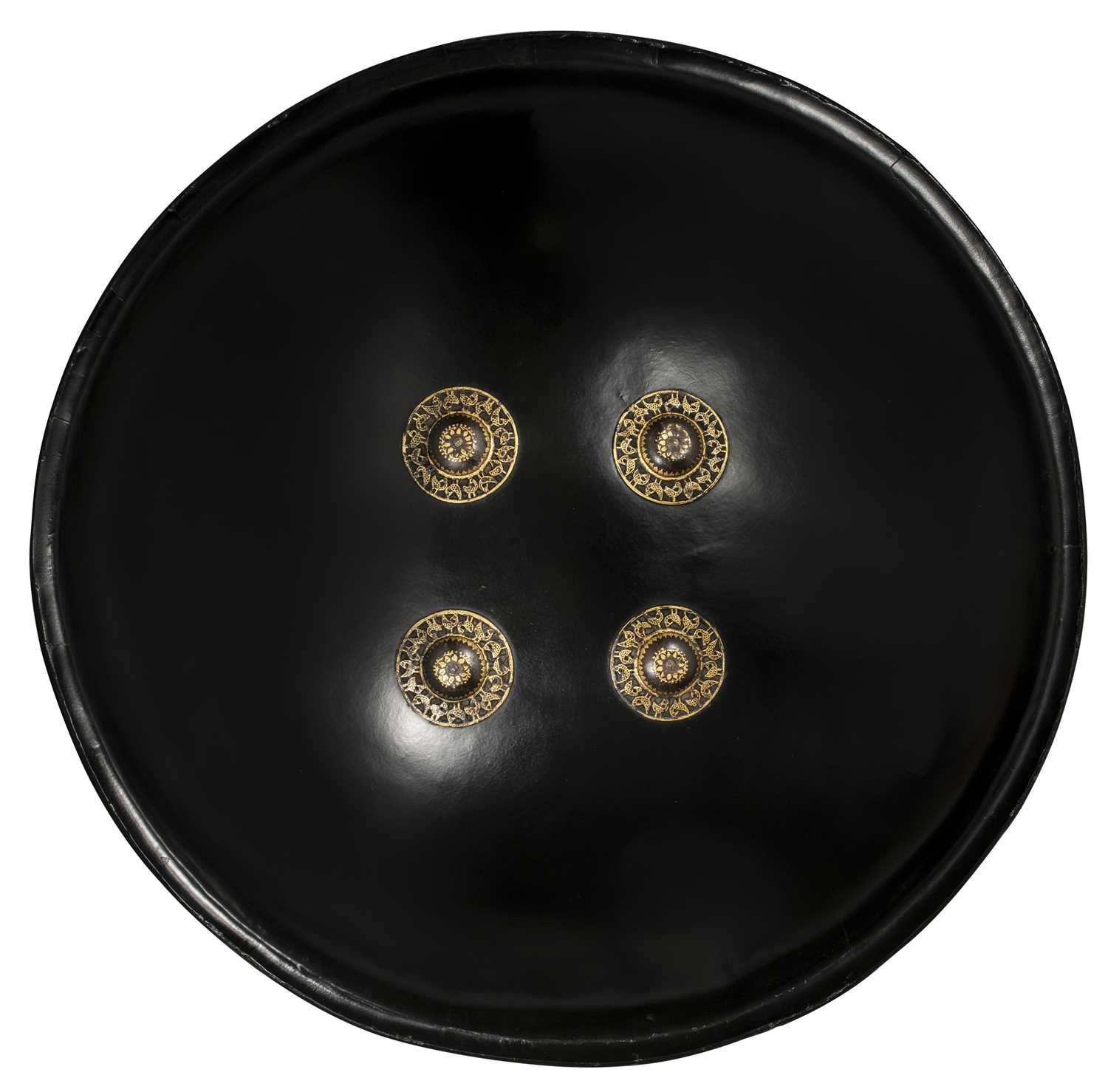 Lot 76 - AN INDIAN BLACK LACQUERED BUFFALO HIDE SHIELD (DHAL), 18TH/19TH CENTURY, POSSIBLY BIKANER