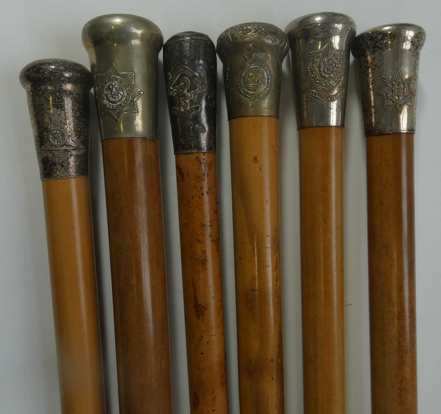 Lot 354 - A COLLECTION OF MILITARY WALKING CANES