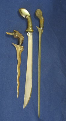 Lot 11 - THREE SOUTH EAST ASIAN DAGGERS