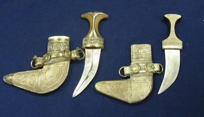 Lot 35 - TWO ARAB SILVER-MOUNTED DAGGERS (JAMBIYAS)