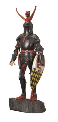 Lot 299 - A FINE CARVED LIMEWOOD MINIATURE ARMOURED FIGURE MODELLED ON THAT OF VOGT ULRICH IX OF MATSCH