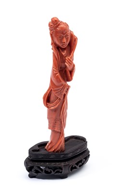 Lot 45 - A CHINESE CORAL FEMALE FIGURE, 19TH CENTURY