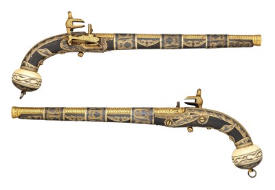 Lot 50 - â€¡ËœA VERY FINE PAIR OF 25 BORE CAUCASIAN GOLD, SILVER AND IVORY-MOUNTED MIQUELET-LOCK PISTOLS