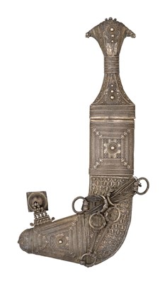 Lot 132 - AN ARAB SILVER-MOUNTED DAGGER (JAMBIYA)