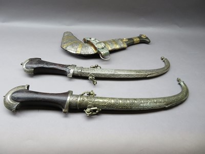 Lot 151 - TWO MOROCCAN DAGGERS (JAMBIYA) AND AN ARAB DAGGER (JAMBIYA)