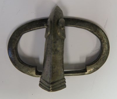 Lot 219 - A SILVER BUCKLE LOOP, EAST GERMANIC, LATE 5TH/6TH CENTURY AND SIX FURTHER BUCKLES