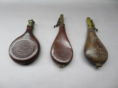 Lot 320 - THREE LEATHER SHOT-FLASKS