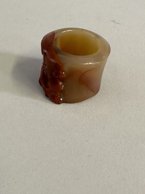 Lot 73 - TWO CHINESE CARVED AGATE ARCHERS RINGS, QING DYNASTY, 19TH CENTURY