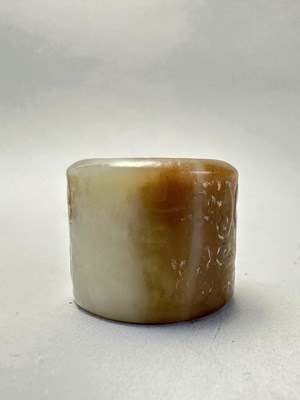 Lot 82 - FOUR CARVED JADE ARCHERS RINGS, QING DYNASTY, 19TH CENTURY