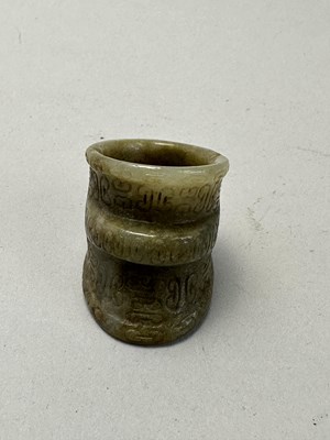 Lot 82 - FOUR CARVED JADE ARCHERS RINGS, QING DYNASTY, 19TH CENTURY