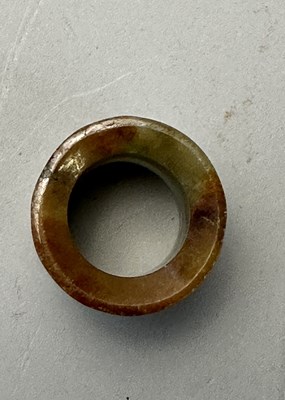 Lot 76 - A GROUP OF SEVEN CHINESE JADE ARCHERS RINGS, QING DYNASTY, 19TH CENTURY