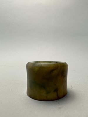 Lot 76 - A GROUP OF SEVEN CHINESE JADE ARCHERS RINGS, QING DYNASTY, 19TH CENTURY