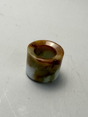 Lot 76 - A GROUP OF SEVEN CHINESE JADE ARCHERS RINGS, QING DYNASTY, 19TH CENTURY