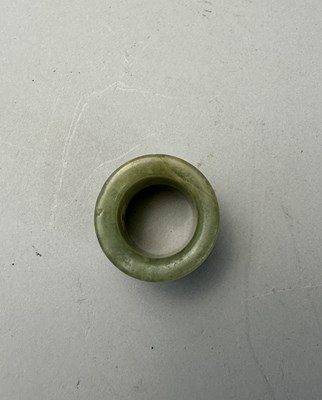 Lot 76 - A GROUP OF SEVEN CHINESE JADE ARCHERS RINGS, QING DYNASTY, 19TH CENTURY