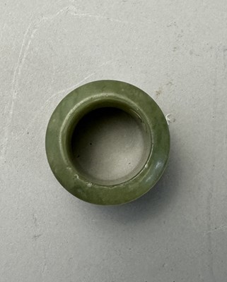 Lot 76 - A GROUP OF SEVEN CHINESE JADE ARCHERS RINGS, QING DYNASTY, 19TH CENTURY