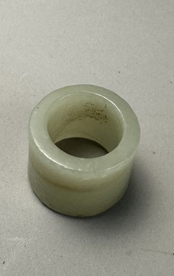 Lot 76 - A GROUP OF SEVEN CHINESE JADE ARCHERS RINGS, QING DYNASTY, 19TH CENTURY