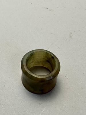 Lot 76 - A GROUP OF SEVEN CHINESE JADE ARCHERS RINGS, QING DYNASTY, 19TH CENTURY