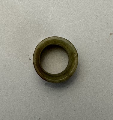 Lot 76 - A GROUP OF SEVEN CHINESE JADE ARCHERS RINGS, QING DYNASTY, 19TH CENTURY