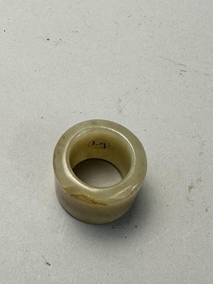 Lot 76 - A GROUP OF SEVEN CHINESE JADE ARCHERS RINGS, QING DYNASTY, 19TH CENTURY