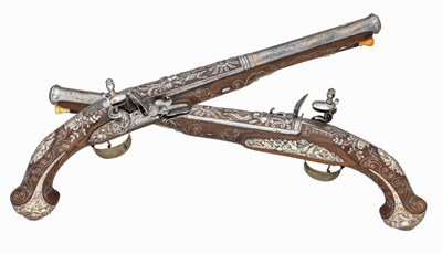 Lot 478 - â€¡ËœA PAIR OF 15 BORE FRENCH SILVER-MOUNTED FLINTLOCK HOLSTER PISTOLS FOR THE EASTERN MARKET