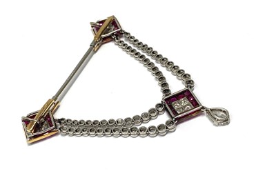 Lot 506 - CARTIER (HENRI PICQ): RUBY AND DIAMOND SURETE PIN, 1910s