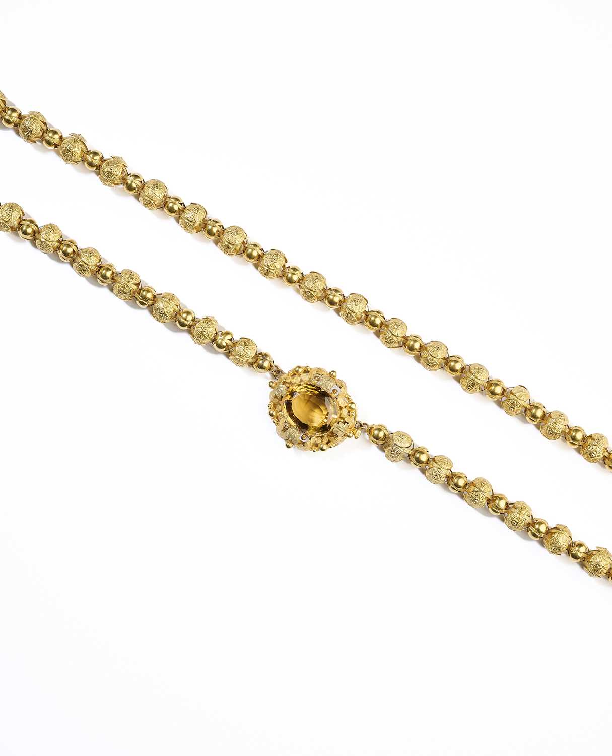 Lot 301 - GOLD AND CITRINE LONG CHAIN, 1830s