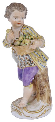 Lot 11 - A MEISSEN FIGURE OF A BOY SELLING PEARS