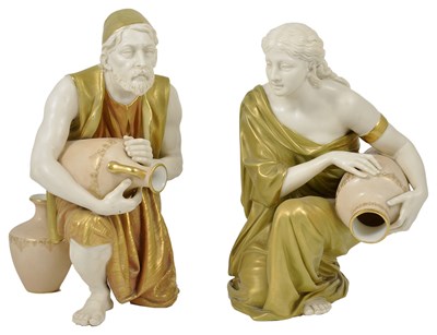 Lot 58 - A PAIR OF ROYAL WORCESTER KNEELING WATER CARRIER FIGURES