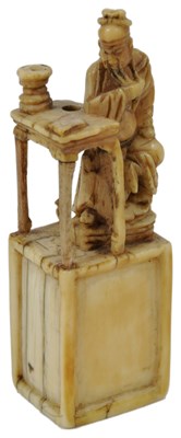 Lot 77 - ~A CHINESE CARVED IVORY MINIATURE GROUP OF GUAN YU