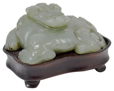 Lot 83 - A CHINESE CELADON JADE CARVING OF A BIXIE