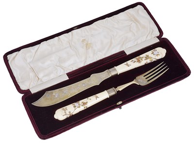 Lot 111 - ~A PAIR OF JAPANESE IVORY HANDLED VICTORIAN SILVER-GILT FISH SERVERS