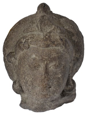 Lot 137 - A BUFF SANDSTONE HEAD OF A DEITY