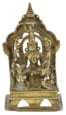 Lot 157 - A JAIN BRASS SHRINE DEPICTING AMBIKA