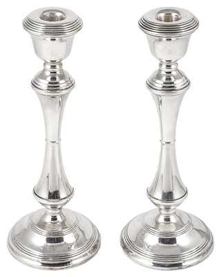 Lot 400 - A PAIR OF SILVER CANDLESTICKS