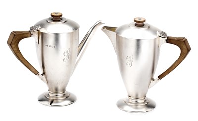 Lot 402 - A PAIR OF GEORGE V SILVER CAFE-AU-LAIT POTS