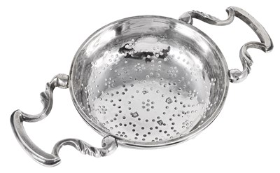 Lot 459 - A GEORGE II SILVER LEMON STRAINER