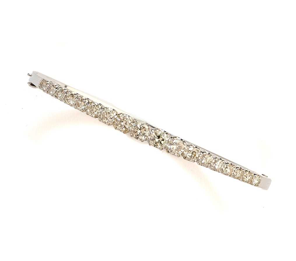 Lot 353 - DIAMOND HINGED BANGLE