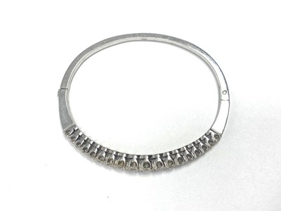 Lot 353 - DIAMOND HINGED BANGLE