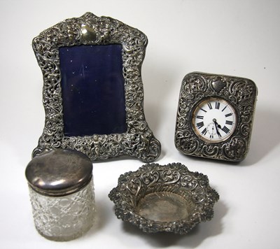 Lot 471 - A VICTORIAN SILVER-MOUNTED PHOTOGRAPH FRAME