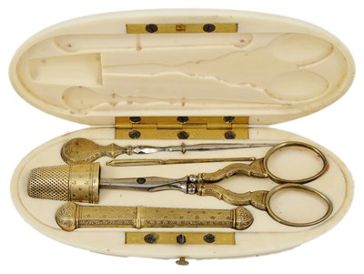 Lot 479 - ~AN IVORY CASED FRENCH SILVER-GILT SEWING NECESSAIRE