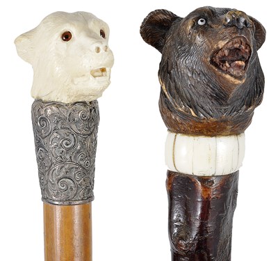 Lot 480 - ~A SILVER-MOUNTED AND CARVED IVORY TOPPED WALKING STICK