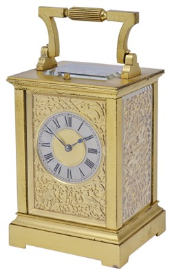 Lot 537 - A GILT-BRASS CARRIAGE CLOCK