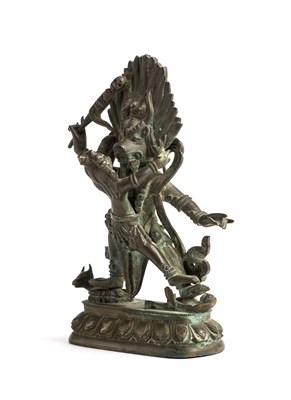 Lot 65 - A SINO-TIBETAN BRONZE FIGURE OF YAMA IN YAB-YUM, 19TH CENTURY