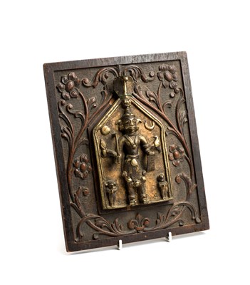 Lot 85 - A CAST BRASS VIRABHADRA PLAQUE, WESTERN DECCAN, INDIA, 19TH CENTURY