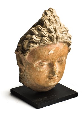 Lot 90 - A GANDHARA STUCCO HEAD OF BUDDHA, 4TH / 5TH CENTURY